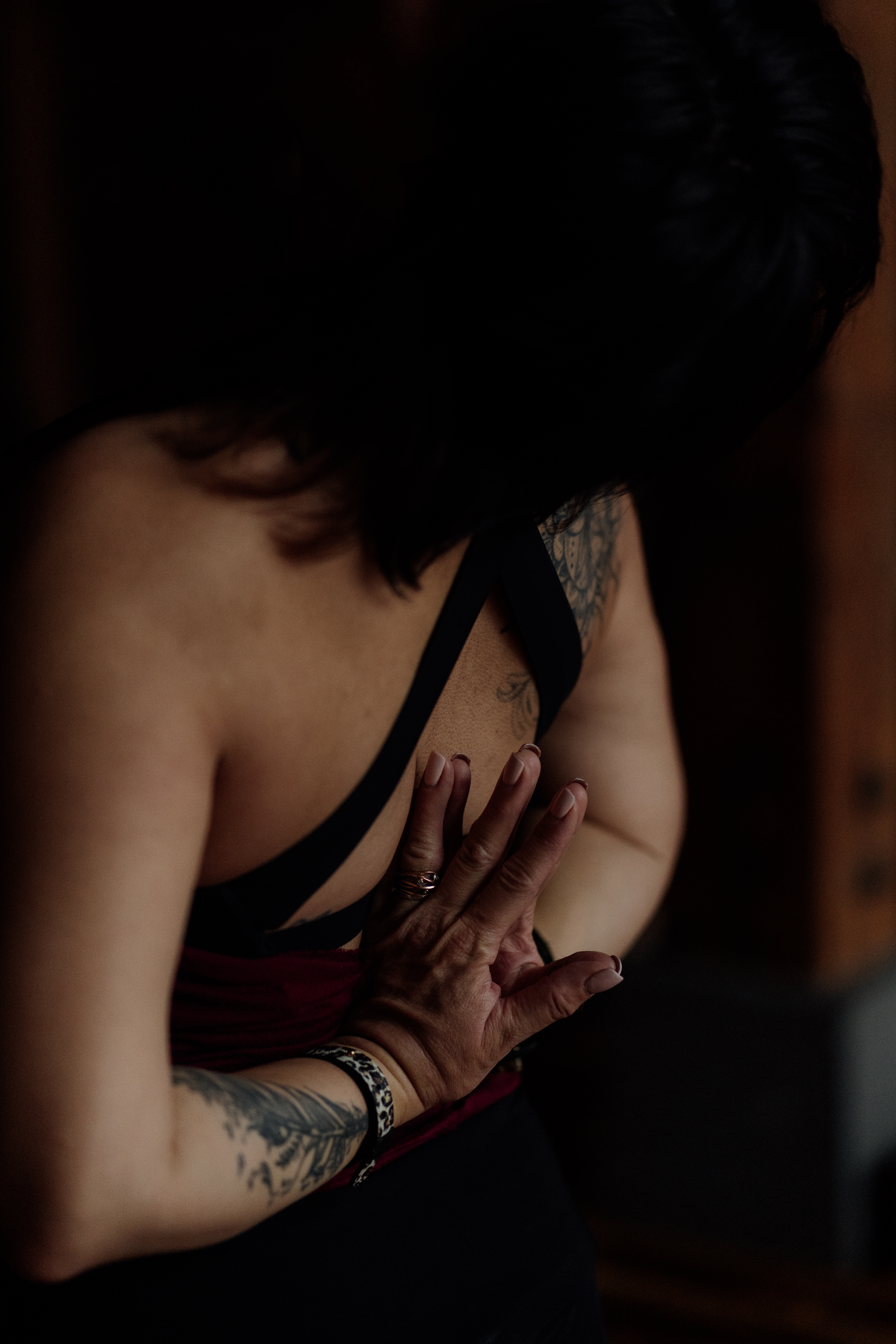 Woman practicing yoga with hands behind her back