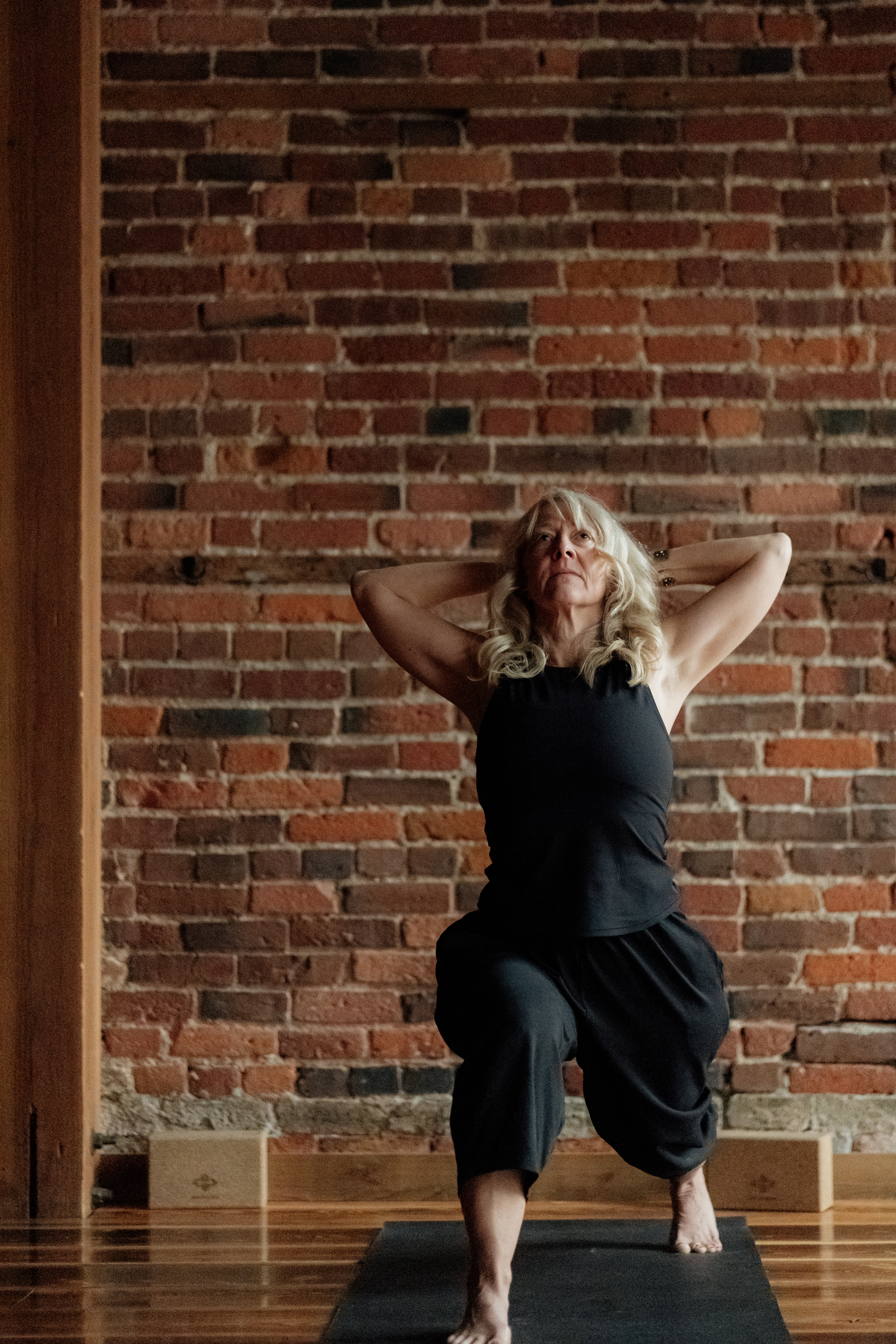 Woman practicing lunge yoga pose