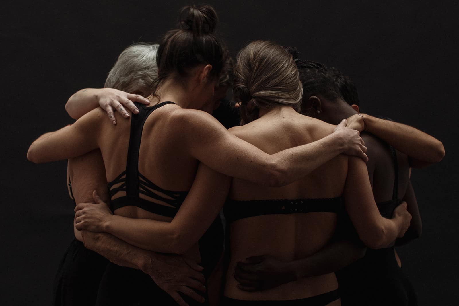 Unity and Support - Our Yoga Teacher Training Family Yoga Teacher Training students embracing in unity, Victoria BC